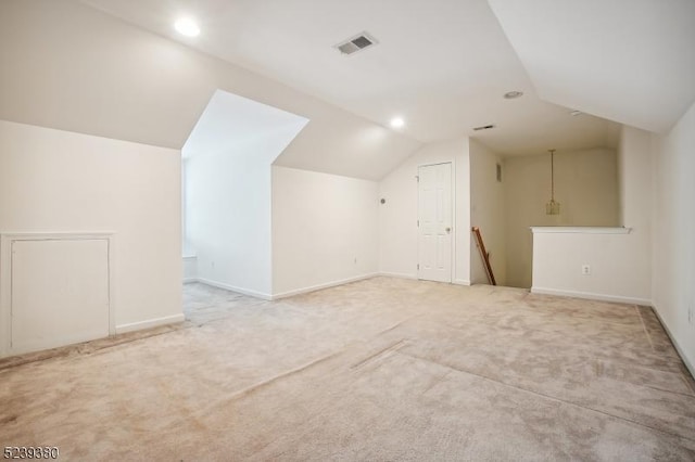12 Hudson Dr, Bernards Twp, NJ 07920 - additional living space with lofted ceiling, light colored carpet, and baseboards