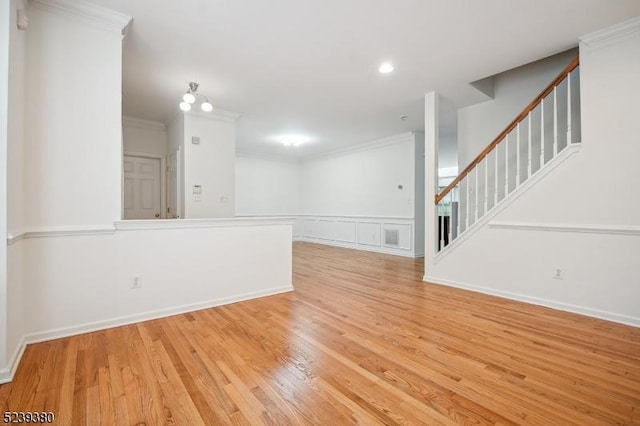 12 Hudson Dr, Bernards Twp, NJ 07920 - empty room with stairs, wood finished floors, crown molding, and recessed lighting