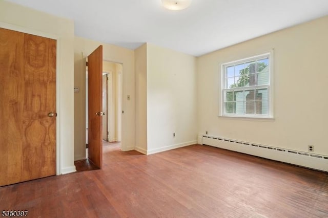 6 Emery Ave, Mendham Boro, NJ 07945 - unfurnished room with wood finished floors, a baseboard heating unit, and baseboards
