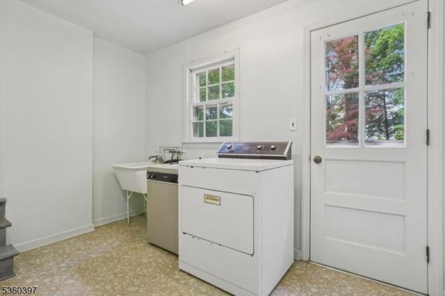6 Emery Ave, Mendham Boro, NJ 07945 - washroom with washer / dryer, light floors, and baseboards