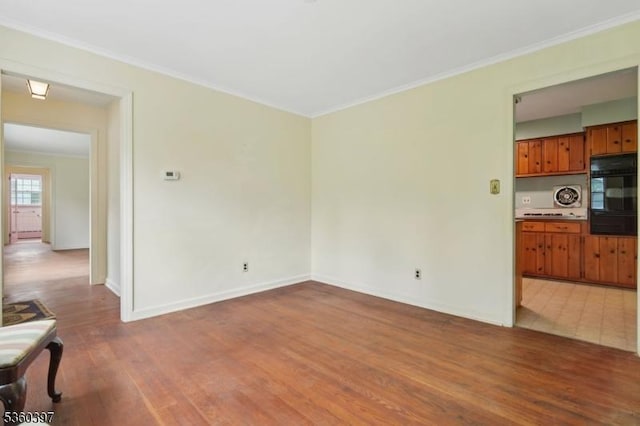 6 Emery Ave, Mendham Boro, NJ 07945 - unfurnished living room with wood finished floors, crown molding, and baseboards