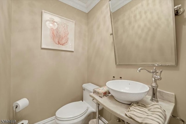 325 Hobar Ct, Franklin Lakes Boro, NJ 07417 - bathroom featuring toilet, ornamental molding, and a sink