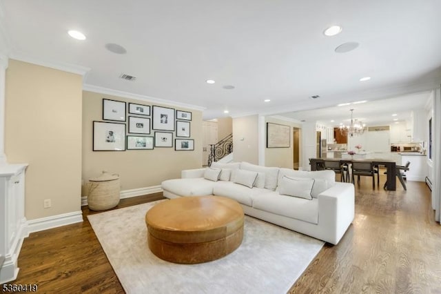 325 Hobar Ct, Franklin Lakes Boro, NJ 07417 - living room featuring ornamental molding, wood finished floors, a chandelier, recessed lighting, and baseboards