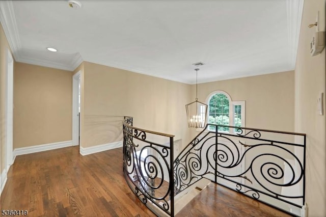 325 Hobar Ct, Franklin Lakes Boro, NJ 07417 - corridor featuring an upstairs landing, a chandelier, ornamental molding, baseboards, and wood finished floors