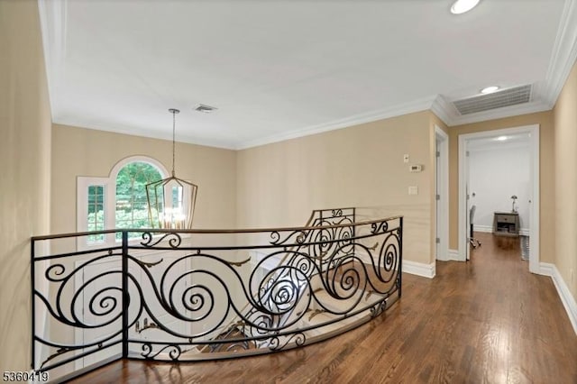 325 Hobar Ct, Franklin Lakes Boro, NJ 07417 - corridor featuring dark wood-style flooring, ornamental molding, a chandelier, an upstairs landing, and baseboards