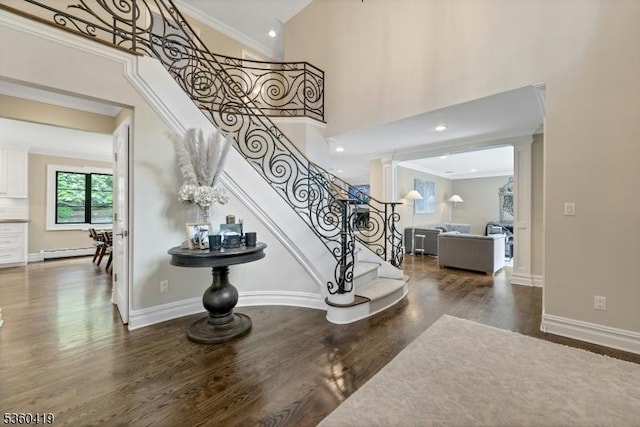 325 Hobar Ct, Franklin Lakes Boro, NJ 07417 - foyer entrance featuring wood finished floors, stairway, ornamental molding, baseboard heating, and baseboards