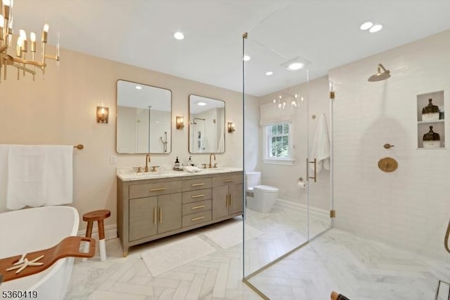 325 Hobar Ct, Franklin Lakes Boro, NJ 07417 - bathroom with a soaking tub, double vanity, an enclosed shower, toilet, and baseboards