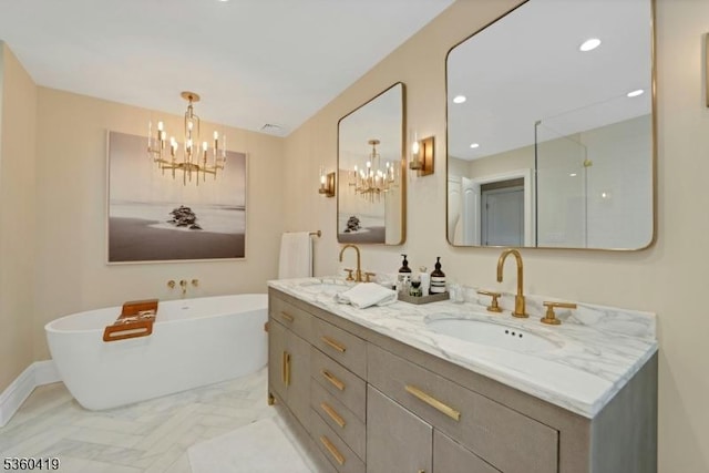 325 Hobar Ct, Franklin Lakes Boro, NJ 07417 - bathroom featuring a chandelier, double vanity, a freestanding tub, baseboards, and a shower