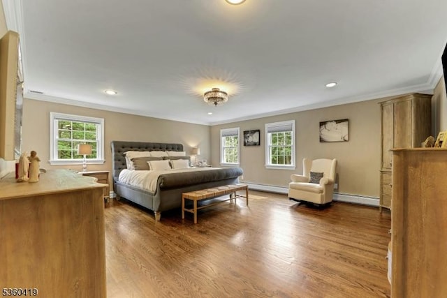 325 Hobar Ct, Franklin Lakes Boro, NJ 07417 - bedroom featuring a baseboard heating unit, ornamental molding, multiple windows, wood finished floors, and recessed lighting