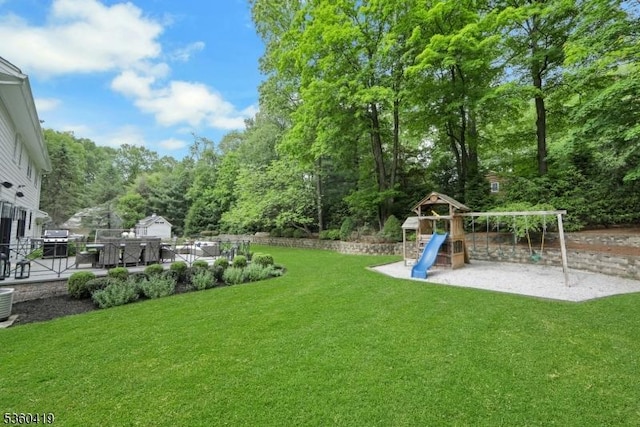 325 Hobar Ct, Franklin Lakes Boro, NJ 07417 - view of grassy yard featuring a playground