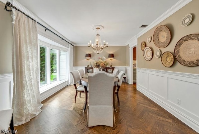 325 Hobar Ct, Franklin Lakes Boro, NJ 07417 - dining space featuring a chandelier, crown molding, and a wainscoted wall