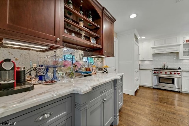 325 Hobar Ct, Franklin Lakes Boro, NJ 07417 - kitchen featuring luxury stove, gray cabinets, open shelves, decorative backsplash, and light stone countertops