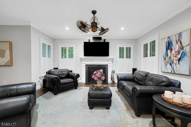 151 Hurd St, Mine Hill Twp, NJ 07803 - living area with light wood finished floors, recessed lighting, plenty of natural light, crown molding, and a fireplace with flush hearth
