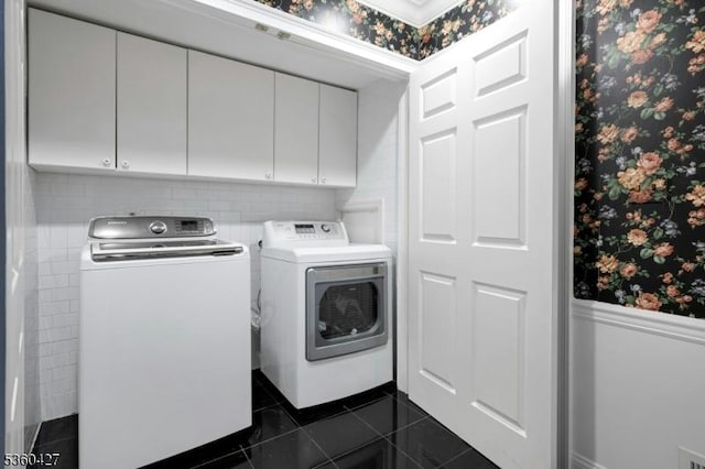 151 Hurd St, Mine Hill Twp, NJ 07803 - laundry room with separate washer and dryer, wallpapered walls, wainscoting, cabinet space, and dark tile patterned flooring