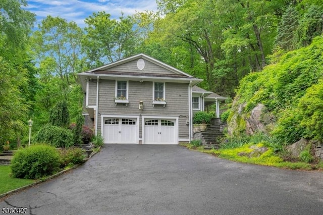 151 Hurd St, Mine Hill Twp, NJ 07803 - view of front of home featuring asphalt driveway and a garage