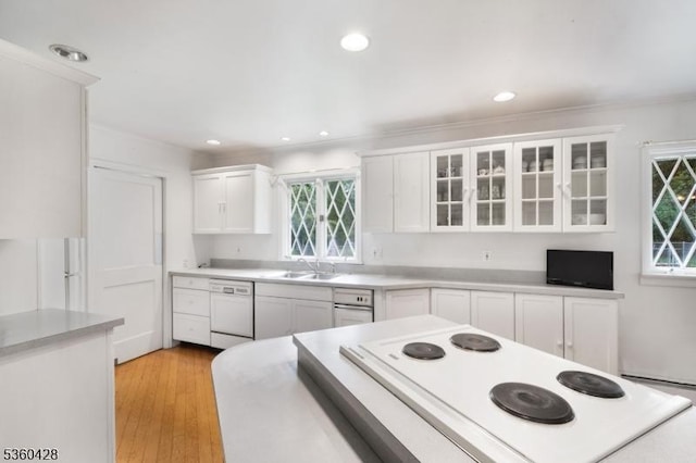 6 Evergreen Pl, Washington Twp, NJ 07840 - kitchen with white dishwasher, range, white cabinets, light countertops, and recessed lighting