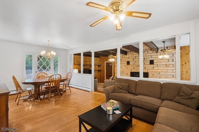 6 Evergreen Pl, Washington Twp, NJ 07840 - living room featuring ceiling fan, light wood-style flooring, a baseboard heating unit, and a chandelier