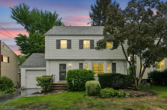 8 Pine Tree Ter, Madison Boro, NJ 07940 - colonial home with a garage, concrete driveway, and stucco siding