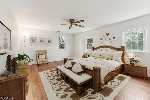 8 Pine Tree Ter, Madison Boro, NJ 07940 - bedroom featuring multiple windows, light wood-style flooring, a ceiling fan, and baseboards