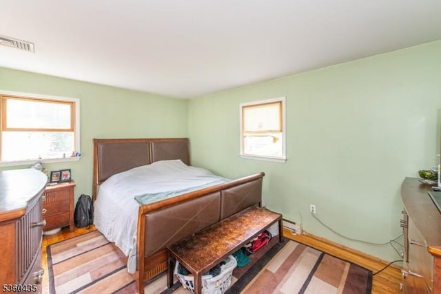 110 Shore Rd, Green Twp, NJ 07821 - bedroom with light wood-type flooring and baseboard heating
