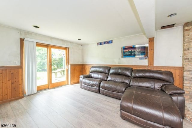 110 Shore Rd, Green Twp, NJ 07821 - living area with a wainscoted wall, wood finished floors, and wooden walls