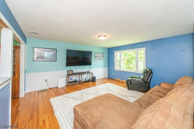 110 Shore Rd, Green Twp, NJ 07821 - living room featuring wainscoting and light wood-style flooring
