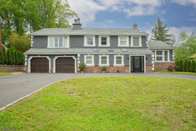 60 Queens Rd, Rockaway Twp, NJ 07866 - view of front facade featuring asphalt driveway, a chimney, an attached garage, a front lawn, and stone siding