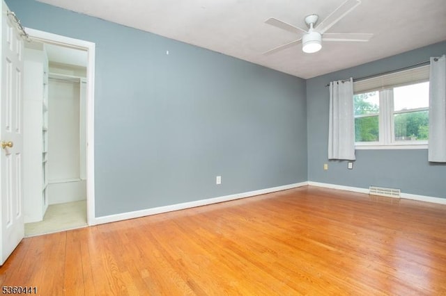 60 Queens Rd, Rockaway Twp, NJ 07866 - unfurnished bedroom featuring light wood-style floors, baseboards, a closet, and ceiling fan