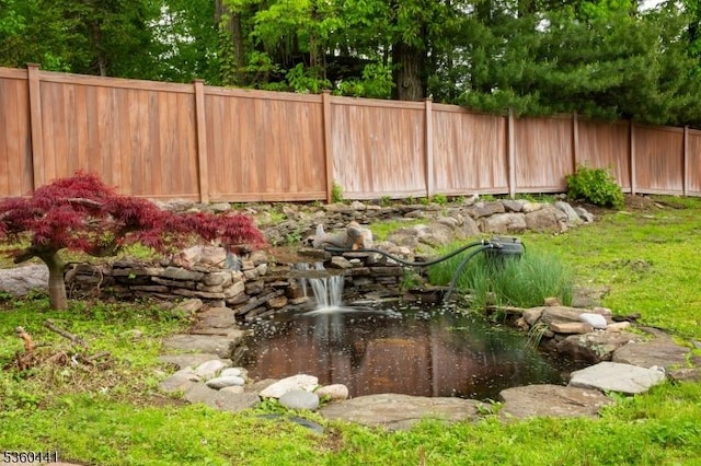 60 Queens Rd, Rockaway Twp, NJ 07866 - view of yard featuring a small pond
