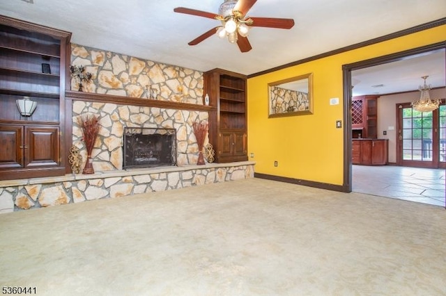 60 Queens Rd, Rockaway Twp, NJ 07866 - unfurnished living room featuring carpet flooring, a chandelier, ceiling fan, ornamental molding, and a fireplace