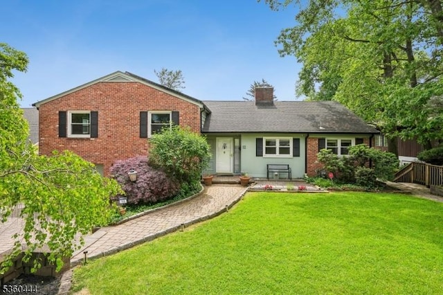 12 Beaumont Ter, West Orange Twp, NJ 07052 - view of front of property with brick siding and a chimney
