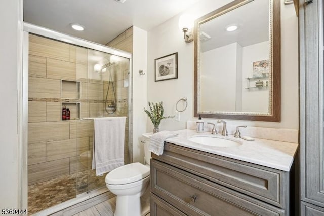 12 Beaumont Ter, West Orange Twp, NJ 07052 - bathroom featuring vanity, toilet, a stall shower, and recessed lighting