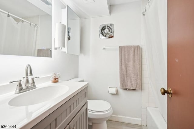 12 Beaumont Ter, West Orange Twp, NJ 07052 - full bathroom with toilet, vanity, baseboards, and shower / tub combo with curtain