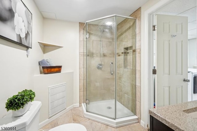 12 Beaumont Ter, West Orange Twp, NJ 07052 - bathroom with vanity, a stall shower, toilet, and baseboards