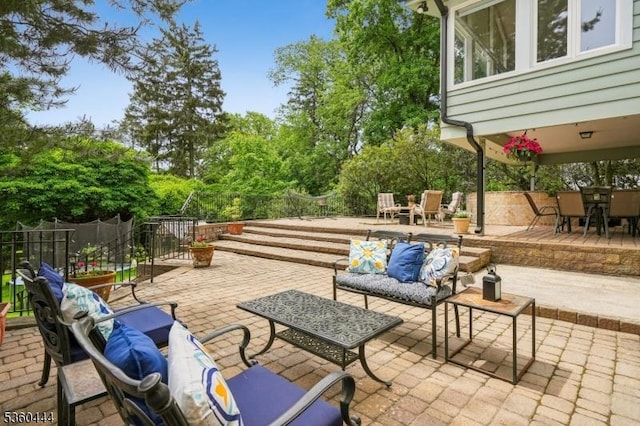 12 Beaumont Ter, West Orange Twp, NJ 07052 - view of patio featuring an outdoor living space, outdoor dining area, and view of wooded area