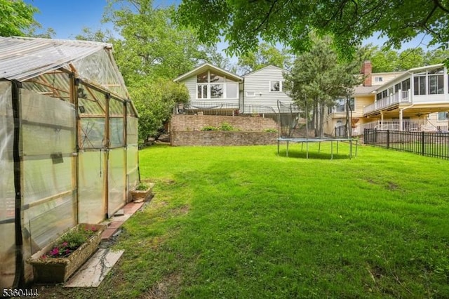 12 Beaumont Ter, West Orange Twp, NJ 07052 - view of yard with a greenhouse, an outbuilding, and a trampoline