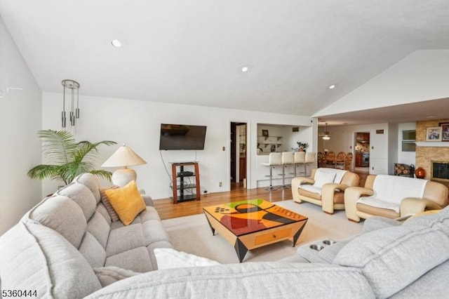 12 Beaumont Ter, West Orange Twp, NJ 07052 - living room featuring lofted ceiling, wood finished floors, recessed lighting, and a fireplace