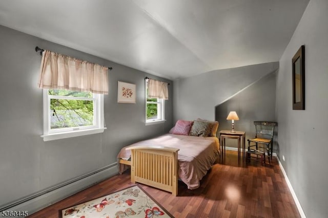 624 New St, River Vale Twp, NJ 07675 - bedroom with a baseboard radiator, wood finished floors, and baseboards
