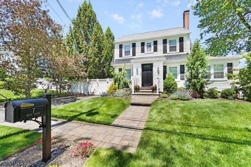 7 W Craig St, Bernards Twp, NJ 07920 - view of front facade featuring a chimney
