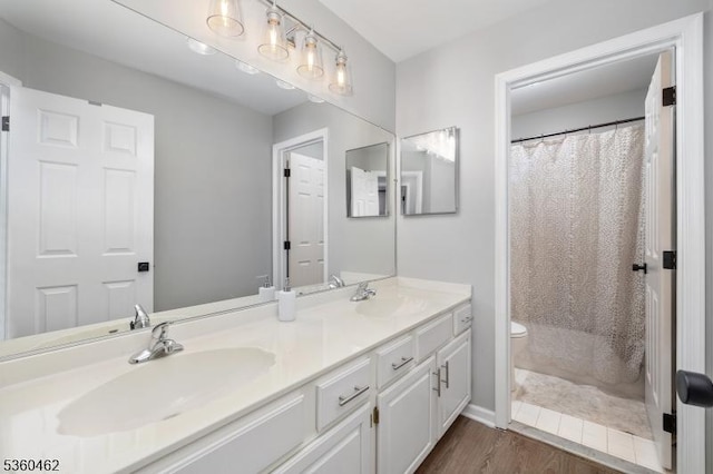 18 Hartley Ln, Bernards Twp, NJ 07920 - bathroom featuring double vanity, toilet, wood finished floors, and curtained shower