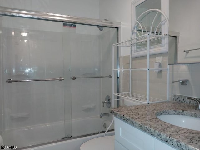 281 Reynolds Ter Unit 24, City Of Orange Twp, NJ 07050 - bathroom with vanity, toilet, and shower / bath combination with glass door