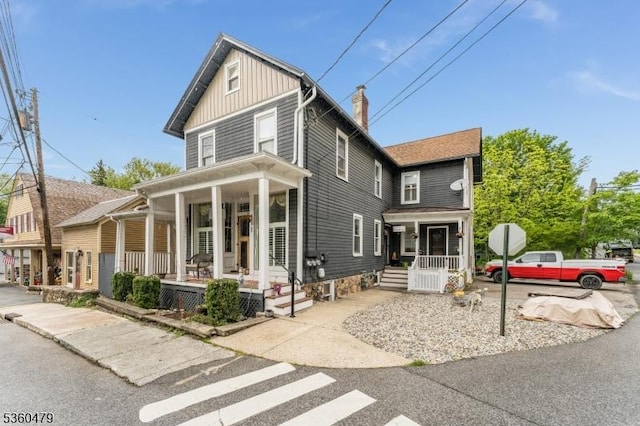 44 Main St, Califon Boro, NJ 07830 - view of front of property with covered porch, a chimney, and board and batten siding