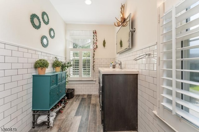 44 Main St, Califon Boro, NJ 07830 - bathroom featuring tile walls, wainscoting, vanity, and wood finished floors