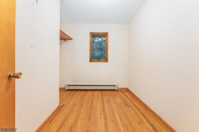 125 Free Union Rd, Liberty Twp, NJ 07823 - spacious closet featuring baseboard heating and light wood finished floors
