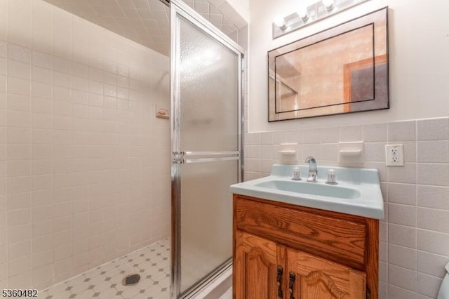 125 Free Union Rd, Liberty Twp, NJ 07823 - full bath with a stall shower, vanity, tile walls, and wainscoting