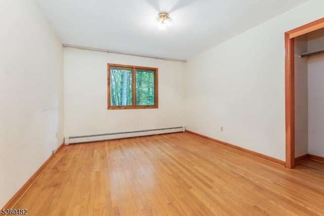 125 Free Union Rd, Liberty Twp, NJ 07823 - spare room featuring baseboard heating and light wood finished floors