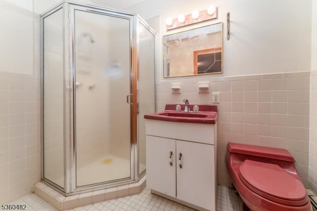 125 Free Union Rd, Liberty Twp, NJ 07823 - full bath with tile walls, a shower stall, vanity, tile patterned flooring, and wainscoting