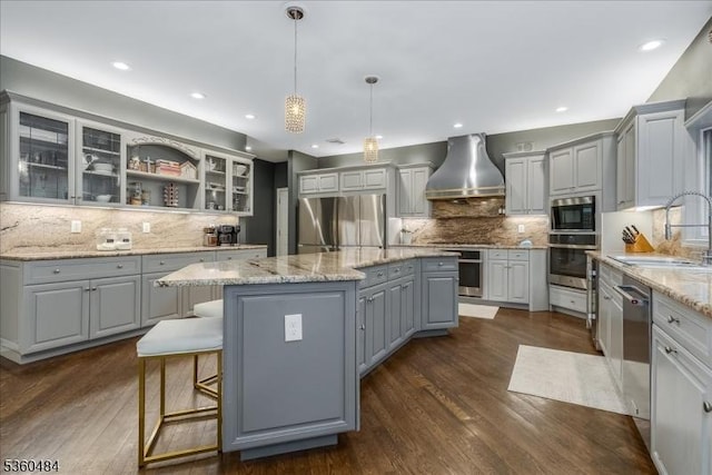 95 Underrock Rd, Sparta Twp, NJ 07871 - kitchen with appliances with stainless steel finishes, premium range hood, gray cabinets, a sink, and backsplash