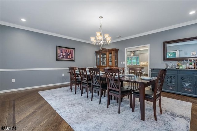 95 Underrock Rd, Sparta Twp, NJ 07871 - dining area featuring wood finished floors, a chandelier, crown molding, baseboards, and recessed lighting