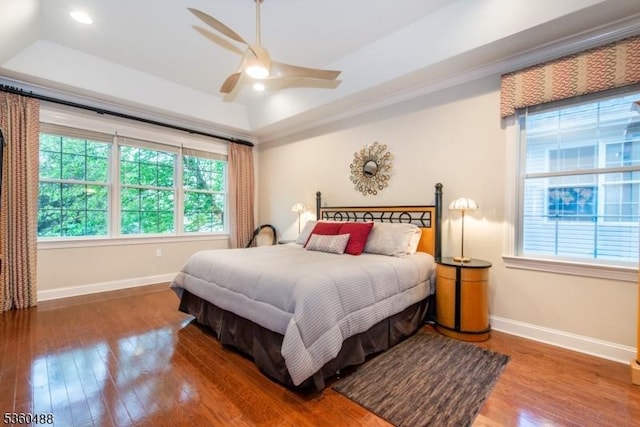 53 Patriots Way, Franklin Twp, NJ 08873 - bedroom featuring wood finished floors, baseboards, a tray ceiling, recessed lighting, and ornamental molding